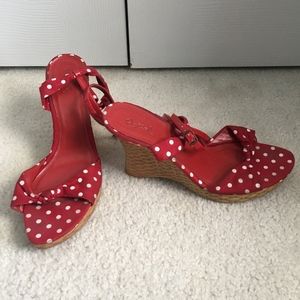 Red and white polka dot wedge shoes